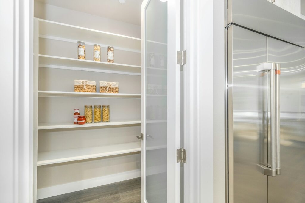 white wooden framed glass cabinet